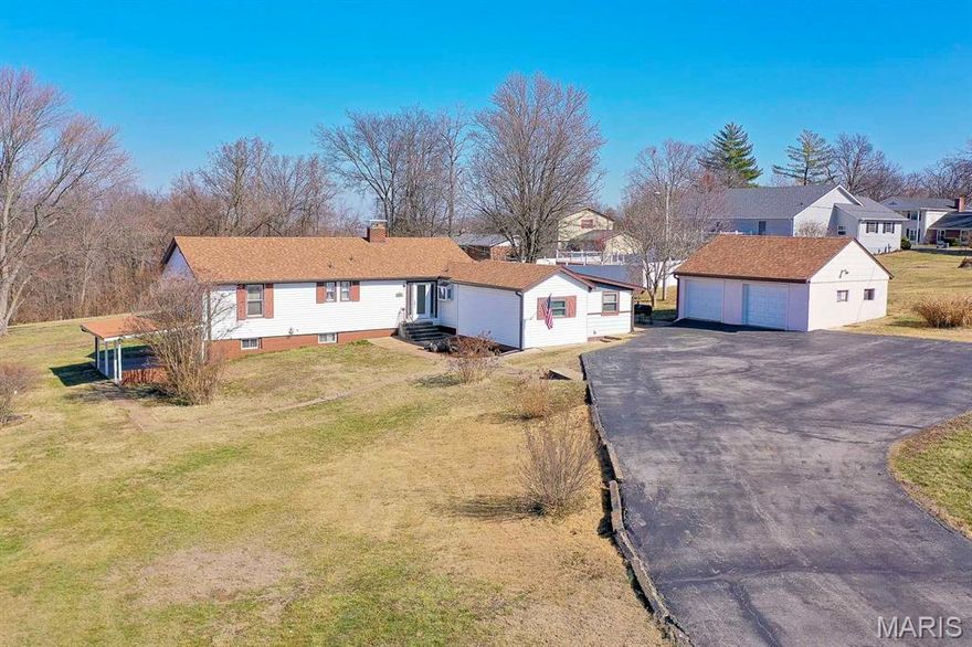 Price listed is Starting Bid Only. Bidding starts closing 3/31/2026 @ 5 p.m. This charming three bedroom home offers the ideal mix of country serenity and modern convenience on 3.44± acres just minutes from schools, parks, and I 55. A custom galley kitchen leads to a formal dining room, while a flexible bonus room provides space for an office, mudroom, or laundry and opens to a relaxing concrete patio. The bright living room features hardwood floors, a wood burning fireplace, and large bay windows that frame the peaceful surroundings. Three spacious bedrooms share a full bath and an additional half bath; all conveniently located along the main hallway. The partially finished basement adds valuable living space with a remodeled three quarter bath, a large recreational room, an eat in kitchen area with private walk out access, and a bonus room that could serve as a fourth bedroom. A detached two car garage sits at the end of a winding asphalt driveway, while two patios overlook the expansive lawn, wooded backdrop, and fruit trees that enhance the property’s natural charm. Recent 2025 updates including a new roof, gutters, partial siding, and garage doors, ensure comfort and confidence for years to come. Property will sell under auction terms and be sold AS- IS, WHERE-IS. Seller, will not make any repairs as a result of any building, occupancy, or environmental inspections. Buyer will be required to sign an Auction Purchase & Sale Agreement if final bid is accepted by Sellers