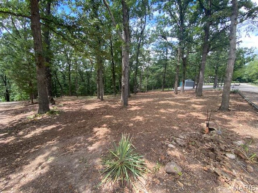 TAKE A LOOK AT WHAT THE OWNERS HAVE DONE TO THIS LAKE PERRY LOT! This camp with permit on a corner lot has just been cleared so the new owners are ready to enjoy their new get away.  There is still time to camp and enjoy all the amenities Lake Perry has to offer, swimming in the pool or lake, bathhouse, playgrounds, boating, sandy beaches, fishing or simply relaxing.  Within walking distance to the pool.  This lot offers electric and has water on the property.