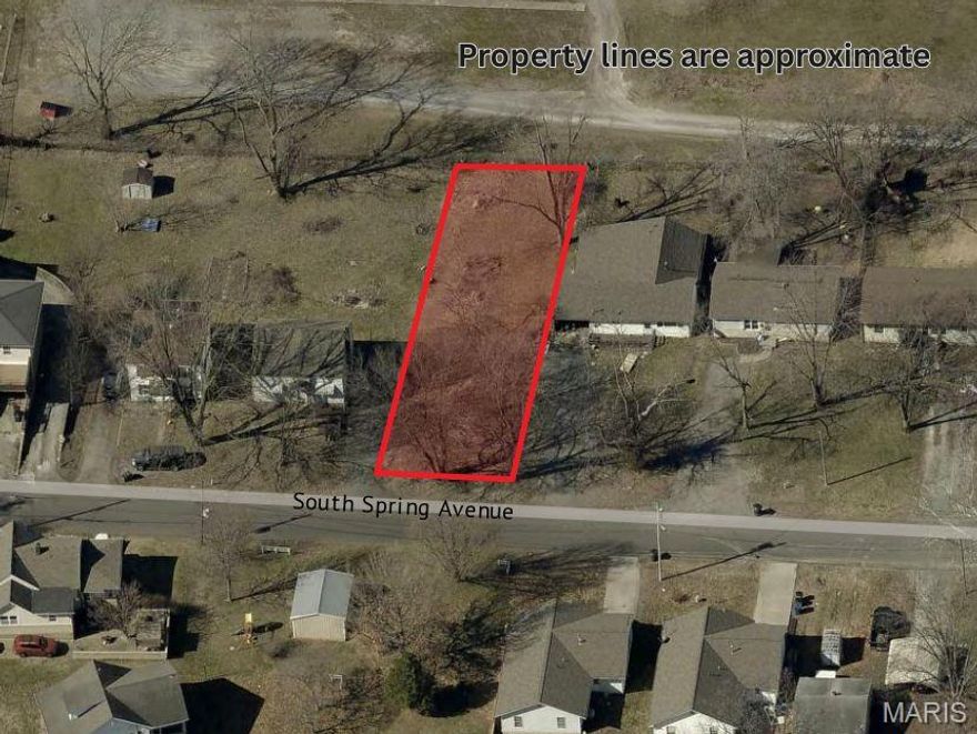 Nice, level building lot on S. Spring Ave. in central Cape Girardeau.  No restrictions or HOA!