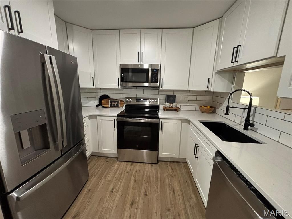 Photo of 1756 Pineberry Court, St Louis, MO 63146 (MLS # 26019707)