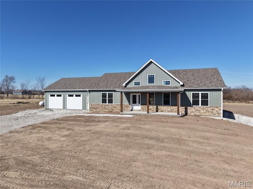 New construction loaded with custom features and thoughtful upgrades throughout!
Step inside to soaring 11-foot ceilings that vault to an impressive 16 feet, creating a bright and open living space anchored by a custom plank accent wall with electric fireplace.
The open-concept kitchen showcases 42” cabinetry topped with crown molding, a spacious island with seating, and a walk-in pantry with adjustable shelving — perfect for everyday living and entertaining. Just off the oversized garage, the laundry room offers abundant cabinetry and generous countertop workspace.
The primary suite is a true retreat featuring a luxurious bath with soaking tub, walk-in shower, double vanity, private water closet, and a custom closet complete with built-in shelving and hanging racks. Two guest bedrooms are thoughtfully positioned on the opposite side of the home for privacy, including one with a walk-in closet.
Enjoy outdoor living on the covered patio overlooking the flat backyard.
The basement welcomes you with 9-foot ceilings and incredible potential — two bedrooms framed with full egress windows, a stubbed full bath, spacious family room area, and ample storage. Additional highlights include a side walkout, two hot water heaters, and a gas forced-air furnace.
The oversized garage with installed drains provides exceptional space — ideal for large trucks, SUVs, or extra storage.
This builder’s attention to detail and upgraded finishes truly set this home apart from the rest.
(3 finished bedrooms on the main level with 2 additional unfinished bedrooms in the basement)
(2 finished bathrooms on the main level with 1 unfinished bathroom in the basement)
