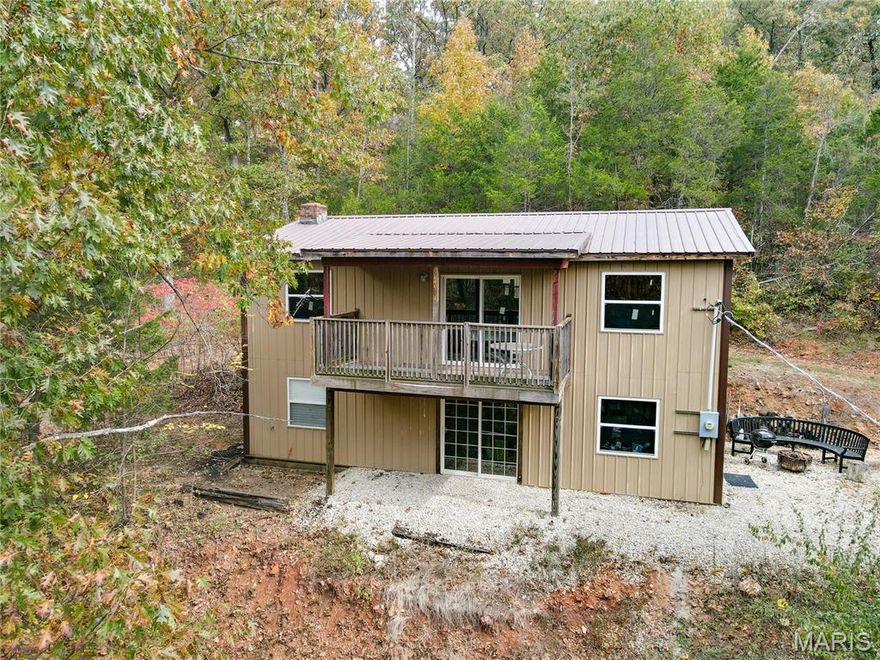 Great opportunity for any outdoorsman, hunter or fisherman.  Over 40 acres of Big River waterfront property now available.  Property features a rustic cabin on the hillside with electric, well, and septic including newer windows, roof and metal siding.  Other buildings on the property include an older barn and storage.  Enjoy your day riding your ATV or walking on the several trails throughout the wooded property.  Go fishing, kayaking or just relax on the gravel bars at the Big River waterfront access. There are 2 wells on the property and room to make your dreams come true. Whether you are looking for land to just relax and enjoy nature or make your fulltime home this property is a must see.  Set up your showing to see all that is property has to offer.
Duplicate listing: MLS #25070559