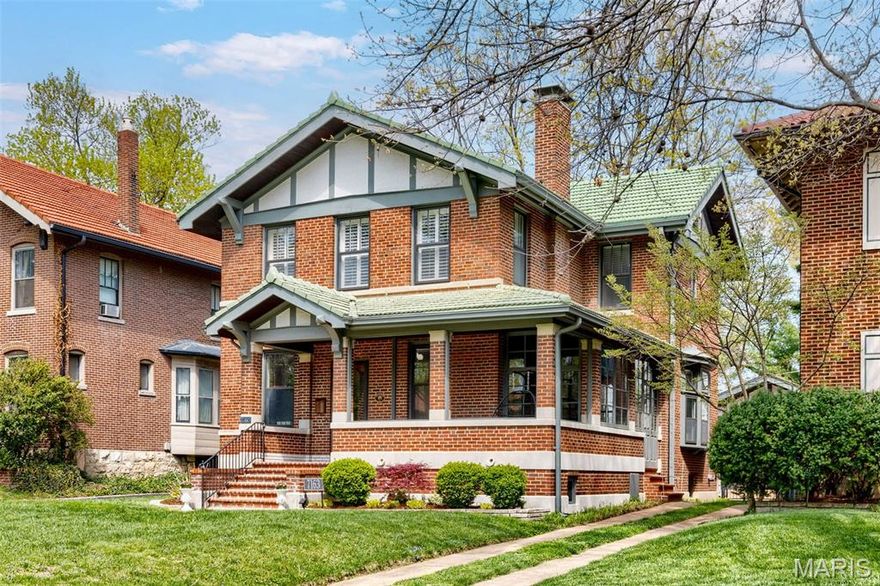 Exceptional U-City home with charming curb appeal, featuring a pillared front porch and distinctive green tile roof. Inside, you’ll find a flexible floor plan with a spacious living area large enough to accommodate both living and dining spaces, as currently arranged. Highlights include oversized windows, hardwood floors, built-in cabinetry, a gas fireplace, and elegant moldings. The original dining room, now used as a family room, offers generous space with hardwood flooring, a bow window with transoms, and windows overlooking the backyard. This room connects to an enclosed side porch with brick flooring and original leaded glass windows. The kitchen is beautifully updated with features today’s buyers seek, including gas cooking, a large center island with breakfast bar, and a walk-in pantry—rare finds in U-City. Additional highlights include large-format ceramic tile flooring, quality appliances, and direct access to the backyard. A discreet half bath off the kitchen completes the main level. Upstairs, the second floor includes three bedrooms, including a primary suite with a spacious walk-in closet. Two additional well-sized bedrooms and a large bathroom accessible from both the hallway and the primary closet. Completing this house is a finished rec room in the lower level that also provides tremendous storage space and a separate laundry room. Additional features include a two-car garage, a large deck, a fenced yard, gardens, an irrigation system with an app, and a motorized driveway gate. Ideally located on a wide street ending at walkways to Flynn Park Elementary, Flynn Park, tennis courts, and Winslow’s Table—a community gathering spot. Convenient to Washington University, Forest Park, MetroLink, and more, this is a wonderful place to call home.