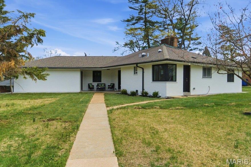 Newly renovated, this all brick ranch lives so much larger than it looks. Enter by way of the darling, covered front porch into the main floor, which features 3 BR/2 full baths and has a beautiful kitchen with Shaker cabinets, solid surface countertops & stainless steel appliances. The modern, open floorplan is ideal for today's lifestyle.  PLUS, there is a so much more living space in the newly renovated lower level. The approx. 1150 additional square footage has been converted to a generous recreation room, 2 additional bedrooms, a sitting room & a third full bath - both levels combined gives your family nearly 2700 sq. ft. to spread out in and enjoy.  The two car garage comes equipped with a new electric vehicle charging station. This lovely "like-new" home is located in desirable Warson Woods, with access to it's community pool, parks, tennis/pickleball/basketball courts, and family friendly atmosphere. Walkable to community pool, grocery stores, restaurants, coffee shops and shopping.