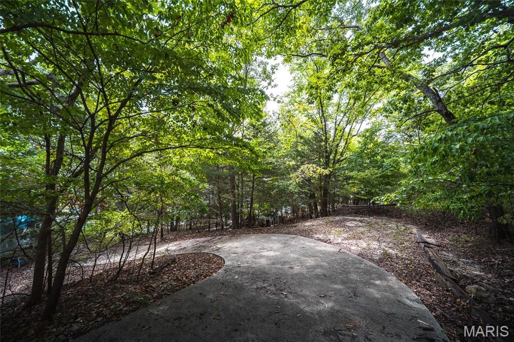 Photo of 705 Winter Wood Loop, Linn Creek, MO 65052 (MLS # 26026495)
