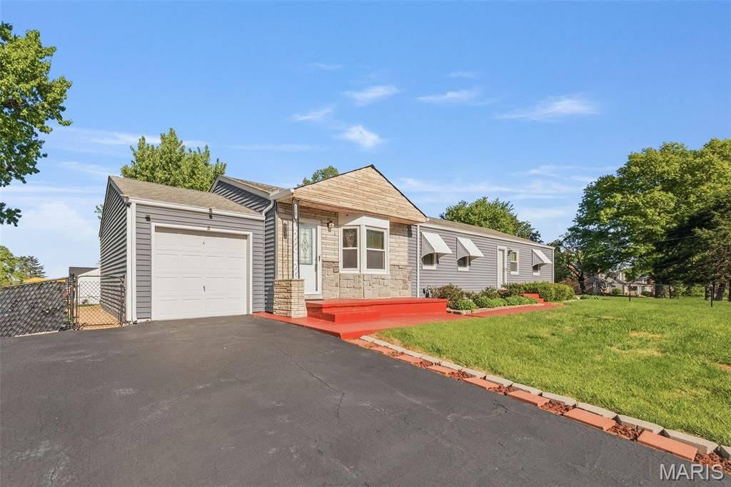 Photo of 5267 Milburn Road, St Louis, MO 63129 (MLS # 26023005)