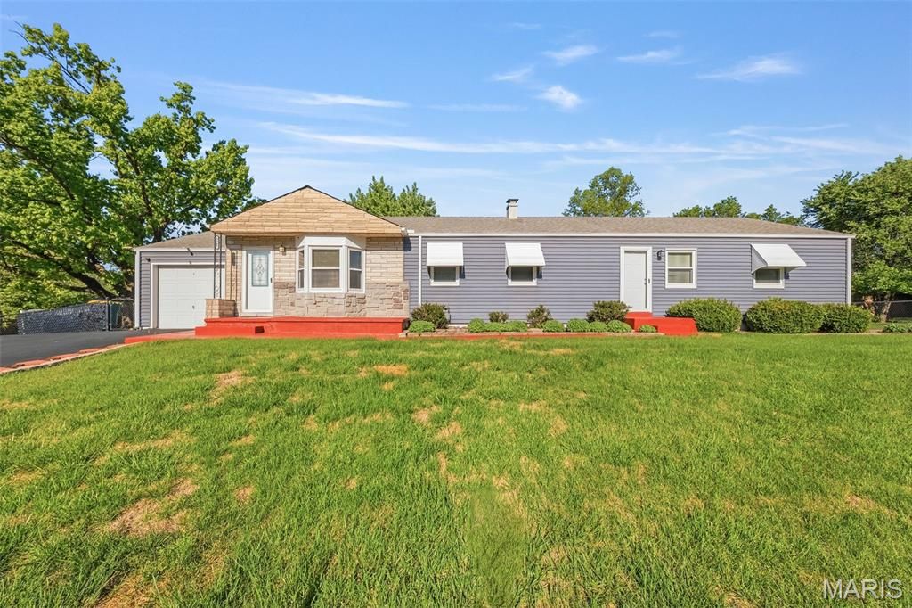 Photo of 5267 Milburn Road, St Louis, MO 63129 (MLS # 26023005)