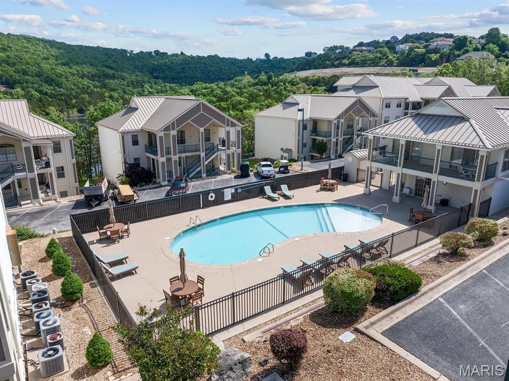 Photo of 135 Upper Emerald Bay Circle Cir #6, Hollister, MO 65672 (MLS # 26018605)