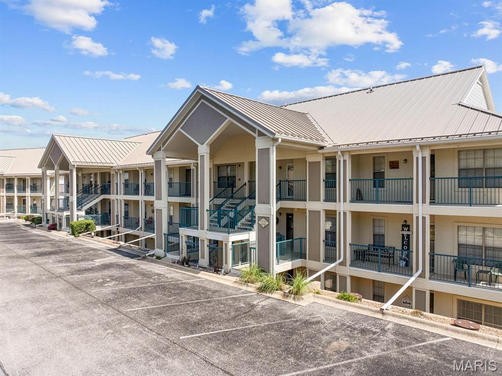 Photo of 135 Upper Emerald Bay Circle Cir #6, Hollister, MO 65672 (MLS # 26018605)