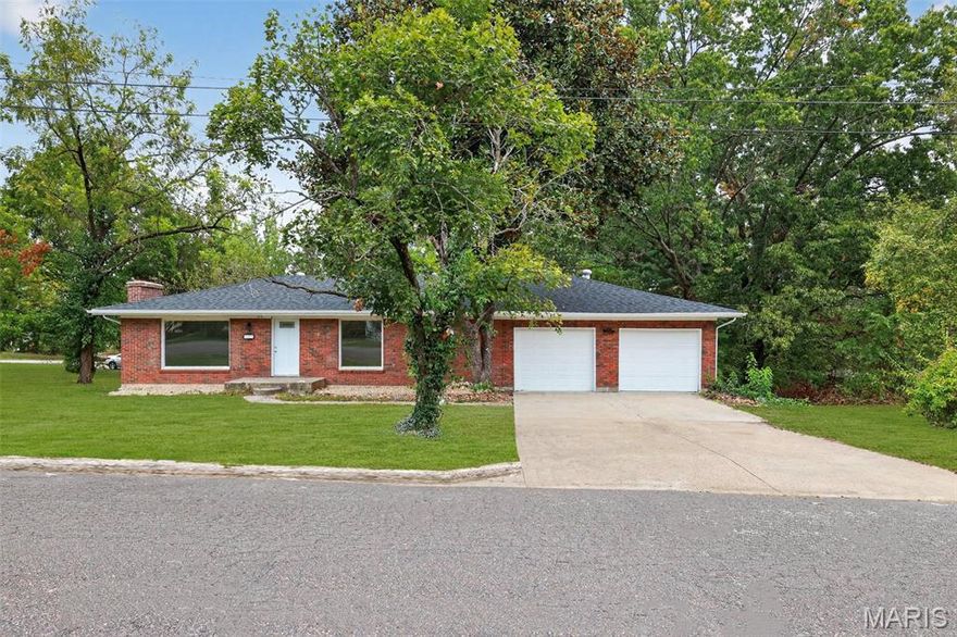 Renovated Rambler with Walkout Basement, Fireplace & Half-Acre Corner Lot! 315 Hillcrest Dr, Bourbon, MO 65441—a fully updated one-story rambler with a walkout basement, sitting on a spacious .512-acre corner lot with mature trees and beautiful landscaping. This home offers 2,464 total square feet of living space, with 1,232 sq ft on the main floor and an additional 1,232 sq ft in the finished basement. The main level features 4 bedrooms and 2 full bathrooms, along with a stunning new kitchen, fresh paint, new flooring, and energy-efficient double-pane windows throughout. The walkout basement adds even more value with a large living room, cozy fi replace, and plenty of space to relax or entertain. With room and plumbing access, there’s potential to add a second kitchen—ideal for a basement apartment or in-law suite Other recent upgrades include: New roof Updated bathrooms Extra-wide two-car garage Modern finishes throughout This move-in-ready home combines classic construction with modern conveniences and is located in a quiet, established neighborhood just minutes from local amenities. Whether you're looking for multigenerational living, rental income potential, or just more space, this home checks all the boxes. New HVAC system that will be installed prior to closing. Schedule your private showing today!