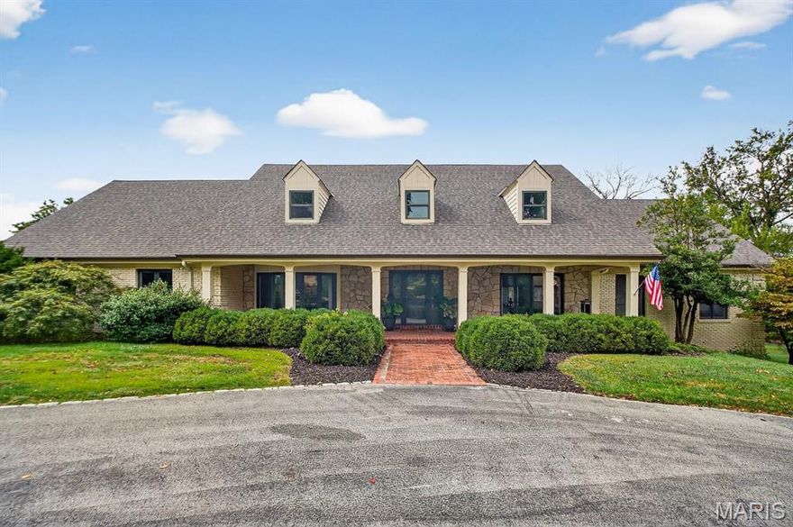 Down a picturesque meandering private road with Bellerive golf course peeking out amid large sprawling family homes, 52 Muirfield offers a gorgeous 6 plus bedrm, updated home surrounded by trees, professional landscaping, pool with hot tub and the quiet one would expect on storied Muirfield.  This renovated home has been opened up and styled with the most sought after finishes throughout.  The open kitchen is the center of the home with custom cabinetry, integrated appliances, large center island, walk in pantry with coffee center, wet bar and breakfast area overlooking the outdoor living space.  Entertaining is made easy with the open great rm, sitting/reception area, dining rm and cozy family surrounded by 3 sides of windows.  The main floor primary is appointed with a large custom closet with laundry, luxury bath with stand-alone tub and large shower.  A private office, custom mudroom and guest powder rm complete the main level.  The upper level does not disappoint offering an open loft area with beverage center, laundry rm, 2 large luxury baths and 5 private bedrms (one used as an office).  The lower level is generous and offers a gym, another lg family rm with fireplace, rec room, full bath, and a bar area with walk out access to the pool.  A 3 car oversized garage, circle drive, wood flooring on all levels, some newer windows, and more.