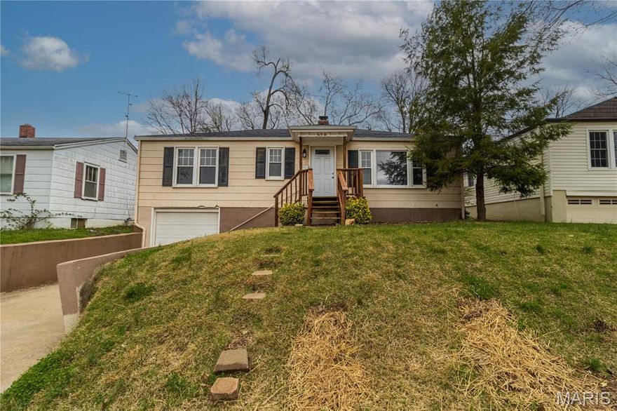 Charming home with all the character, wood floors and classic arched doorways you find in the Sunset Neighborhood. Kitchen and bath have been recently remodeled. The home has a front living room that could also be used as a dining room, and an additional family room that is cozy and spacious for TV hangout time. Vinyl white windows bring in abundant natural light and efficiency. The basement is partially finished and has an additional bathroom with a walk-in shower.  Step outside to a fenced yard with patio and ideal for entertaining, gardening, or pets. Kiddos can even walk to school!  Plus a brand new roof!