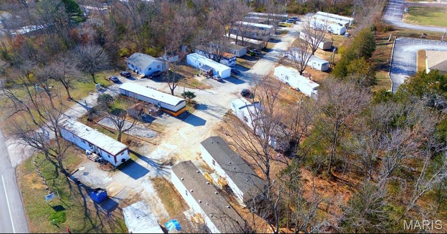 This investment property has the potential of generating a total monthly income of $21,775. Seller is in the process of adding 2 more units to the existing park now, and will finish the process, which will bring the current rent to $11,775 per month, Current rental income is $9,775 per month.  This park sits on 3.46 Acres and is being sold with an additional Tax parcel of 0.21 acres which includes the house that is 928 Sq Ft. and located inside the mobile home park. The park is conveniently located just minutes from restaurants, shopping, schools, and a major highway .  Call today for additional information .