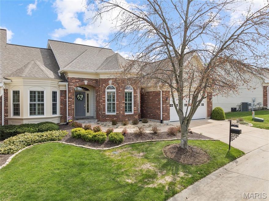 Stunning villa-style home in a gated, low-maintenance community! This move-in-ready home offers an open floor plan, soaring ceilings, hardwood floors, and abundant natural light throughout. Spacious great room with fireplace flows seamlessly into the kitchen featuring custom cabinetry, center island, and breakfast area with access to the elevated deck—perfect for entertaining. Main-level primary suite with a recently remodeled luxury bath showcasing a soaking tub, walk-in shower, and double vanity. Finished lower level offers two bedrooms plus a flexible room with custom built-ins—ideal for a home office or additional bedroom—along with a large rec space and wet bar. Private outdoor setting with deck and patio below. 2-car garage. Prime location near shopping, dining, hospitals, and highways. Turnkey, gated villa living—priced to sell!