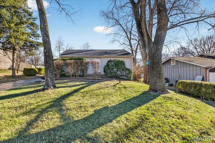 Welcome to 604 Nandale Lane, a charming and well-cared-for 2 bed, 1 bath bungalow tucked on a quiet residential street in desirable Manchester and the Parkway School District. This sweet starter home offers a comfortable layout with hardwood floors throughout and a bright kitchen featuring freshly painted crisp white cabinets. It’s clean, solid, and move-in ready -an easy place to settle in and make your own over time.
Out back, you’ll find a spacious fenced yard with mature trees and plenty of room for pets, play, gardening, or hosting friends. The detached two-car garage provides great off-street parking and extra storage. A tidy unfinished basement adds even more storage space and future possibilities.  An affordable opportunity in a sought-after area, this is the kind of home that’s perfect for first-time buyers, downsizers, or anyone looking for a simple, comfortable place to call home in Parkway Schools.