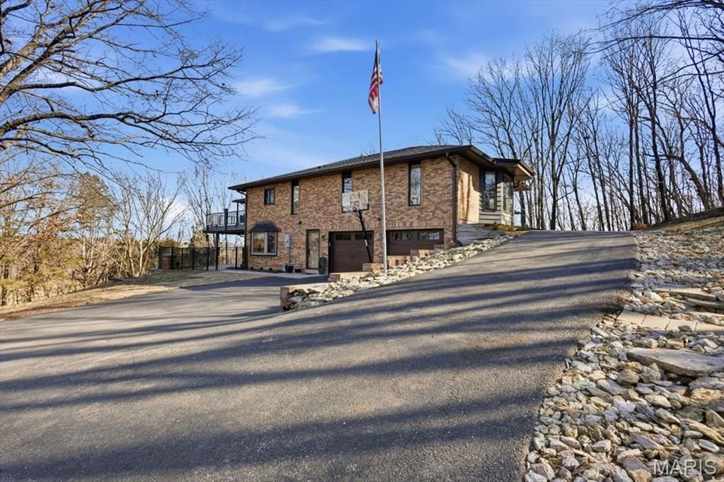 Photo of 9 N Trail Drive, Unincorporated, MO 63025 (MLS # 26004452)