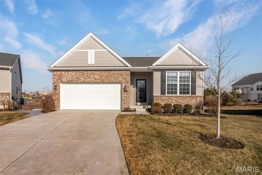 Beautiful Lake St. Louis Home! This move-in ready ranch can be found on a cul-de-sac in the Legends Pointe Community. At first glance you are welcomed with beautiful surrounding landscaping, a large driveway and covered front porch. Enter into the foyer that leads you to a nice-sized office/den and then back to the spacious open floor plan with luxury vinyl plank flooring throughout. Living room boasts tons of natural light from the large windows and a beautiful gas fireplace. The kitchen is gorgeous with custom white cabinetry, an oversized quartz countertop island with breakfast bar and stainless-steel appliances. A convenient dining area with sliding glass doors leading to the back deck finish off this open concept nicely. The sizeable master bedroom suite comes with your own private full master bathroom complete with a double sink vanity, large mirror, tons of storage, a walk-in shower and walk-in closet. Completing the upper level is one of the additional bedrooms, another suitable full bathroom and a main floor laundry room. The lower level is nicely finished with a huge open space perfect for a family room and recreational area. The ideas are endless with this much space. An additional bedroom and full bathroom complete the lower level. Now onto the exterior to highlight the back deck and patio area with an exquisite set up with a level yard, stamped concrete, covered area and an abundance of space to entertain guests. To conclude this beautiful home is a 2-car attached garage and added amenity of being conveniently located close to major highways and desirable shopping/dining destinations. Do not hesitate to come see everything this Lake St. Louis home has to offer!