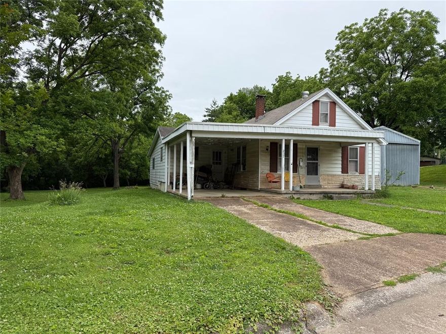 Investor Special in the Heart of Jackson! This 1.5-story home sits on a rare 1.6-acre oversized lot with a creek running along the property line. This property features an addition on the back of the home and tons of potential for the right buyer. It does need significant work, making it ideal for investors or renovators. Don't miss this chance to transform a prime piece of real estate, sold as-is.