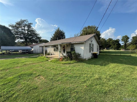 Photo of 1920 Dunklin Street, Kennett, MO 63857 (MLS # 26059889)