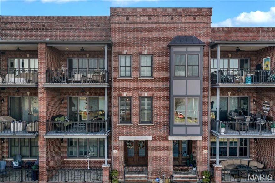 The most SPECTACULAR HOME - AVAILABLE NOW - Right on time for SPRING! Positioned along the banks of the Missouri River in the heart of Downtown Washington, Missouri, 10 W Front St is within one of the most highly desired phases of the downtown developments by Unerstall Construction Co. This is a rare offering where architectural integrity, refined design, and waterfront presence align seamlessly. This is not simply a home. It is a private riverfront retreat set within one of the most walkable and vibrant corridors in the region.

Expansive windows frame uninterrupted views of the Missouri River, capturing soft morning light and breathtaking sunsets that reflect across the water. The setting is both serene and inspiring, offering a daily connection to nature while remaining steps from downtown dining, wine bars, Amtrak, boutiques, seasonal festivals, and riverfront trails. The lifestyle here just seems effortless. 

Spanning three fully finished levels of exceptional quality and taste, this 3 bedroom residence was built with intention at every turn. The craftsmanship is immediately evident, from the extra wide foyers that create a gracious arrival to the real wood flooring and updated designer surfaces that elevate each space. Granite countertops, custom cabinetry, built in shelving, and thoughtful architectural details reflect enduring quality rather than trend.

The main living areas are designed for both everyday comfort and elevated entertaining. Two fireplaces create warmth and ambiance throughout the seasons, while a beautifully appointed wet bar and private wine cellar invite evenings of relaxed sophistication. Whether hosting intimate gatherings or larger celebrations, the flow between spaces feels natural and refined.

The primary suite is a true sanctuary, complete with a private office/sitting space attached for those who value both productivity and privacy. This thoughtful addition allows work to remain separate yet seamlessly integrated into the home’s design. A dedicated workout room further enhances the lifestyle experience, offering convenience without compromise.

An elevator provides easy access to all levels, reinforcing both comfort and long term practicality. Every finish, fixture, and structural element reflects a standard rarely achieved in the area. Simply stated, this is among the best built homes in the region, where strength of construction meets elegance of design.

For the discerning buyer who values craftsmanship, privacy, and a setting that cannot be replicated, this home stands apart. Private showings by appointment. 

Downtown Wash Mo Living | Washington Mo Home For Sale | Luxury Missouri Home | Riverfront Living | Missouri River View