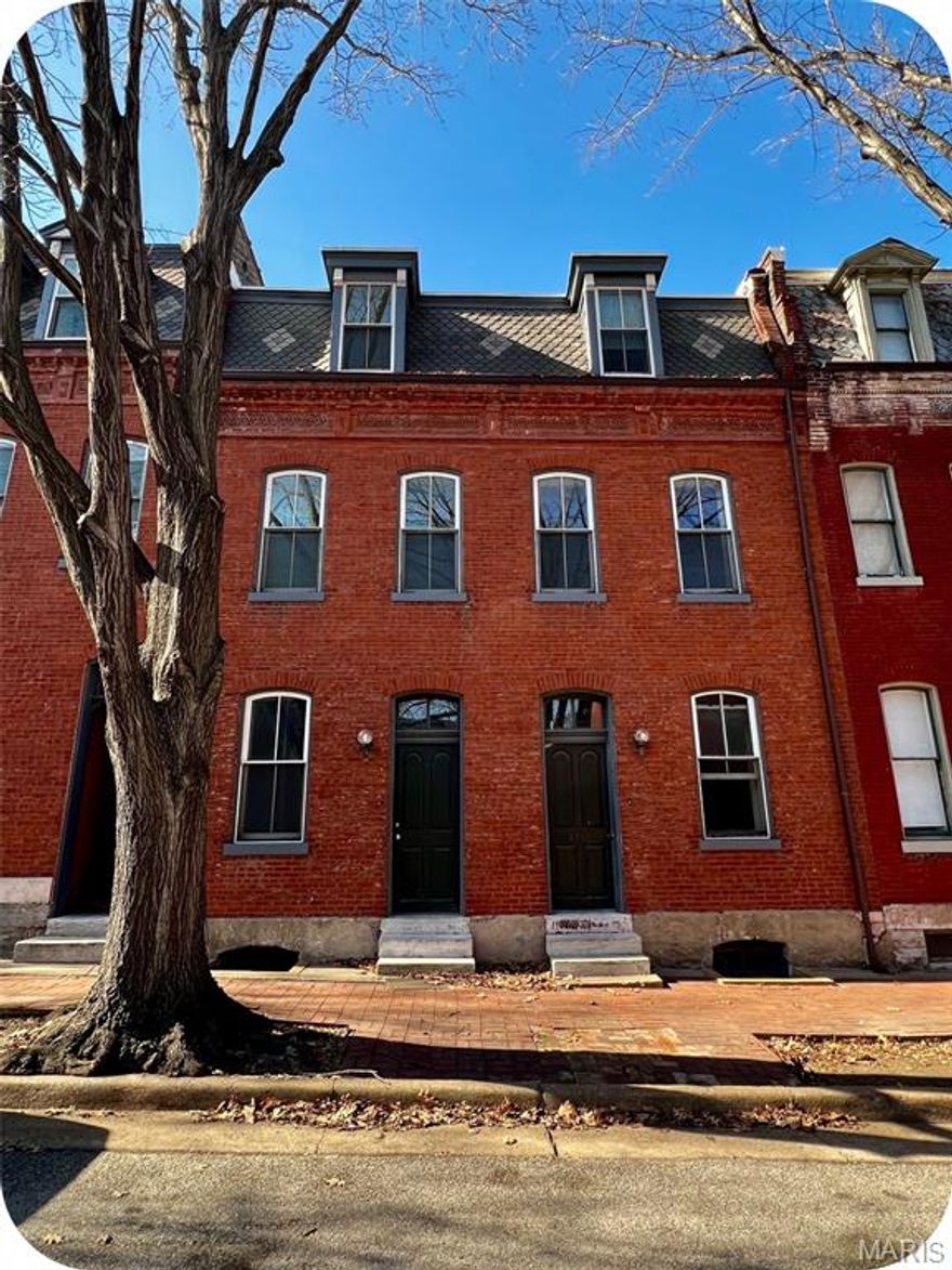 Ready to stop renting and start building wealth—without giving up your social life? This awesome Soulard 4-family is your chance to own real estate and stay close to the good times. Just a short stumble from McGurk’s, Tucker’s, and Molly’s, you’ll be right in the mix of St. Louis’ best nightlife—minus the Uber bills. Live in one unit & rent out the other three to cover most (or maybe all) of your mortgage. That’s right—live practically free while building equity. 

This building underwent a complete historic renovation in 2010 so it's truly turn-key plus it got a new TPO roof in 2021 as well.  The big-ticket items are done, giving you peace of mind and helping protect your cash flow from unexpected maintenance hits.

The 1st-floor units have a classic setup: living room, kitchen & private bedroom. But the upstairs units? Total game-changers. These are 2-story townhome-style apartments with an updated kitchen, living room, in-unit laundry & half bath on the main floor + two bedrooms & full bath on the upper floor. Two apartments are vacant so you can move in, rent to a buddy & still be collecting rent from day one. Lots of perks here like off-street parking (car & golf cart friendly) & a big backyard perfect for BBQs, yard games or just kicking back with a cold beer. 

This is your shot to lock down a killer investment while living in one of STL’s most legendary neighborhoods. Don't get lost in the Zillow shuffle—contact me directly for a private tour!