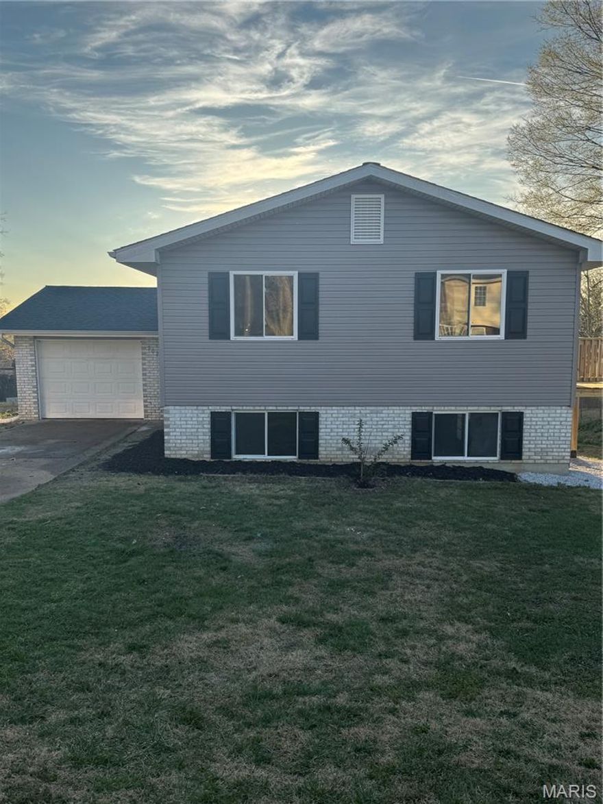 Fully remodeled 3 bed 2 bath home with a 1 car attached garage. Perfect for buyers looking for a quick, hassle free move. This home features brand new luxury waterproof vinyl flooring, completely updated kitchen with new white shaker cabinets, countertops, backsplash, and stainless steel appliances.

Both bathrooms have been updated and the home includes fresh paint, new trim, modern lighting, and new doors throughout. Everything has been done just move in and enjoy. Includes home warranty for added peace of mind. Buyer to verify school district.

Walkout basement offers incredible potential for expansion, with space to add two additional bedrooms and a comfortable living area—ideal for growing families.

Homes like this don`t last! Schedule your showing today!