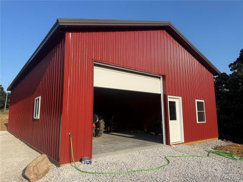 Photo of 1103 Rombauer Avenue, Novinger, MO 63559 (MLS # 26058971)