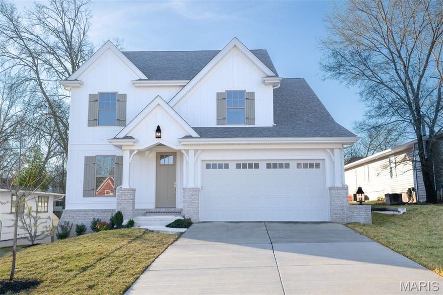 Construction completed January 2026 and move in ready. Come see this new, custom home by Flower Homes! Situated in the popular Kirkwood school district walkable to historic downtown Kirkwood. This two story home offers a bright, open dining, family room and kitchen that’s great for entertaining yet still has a warm, cozy feeling. It has custom cabinets with quartz countertops, stainless steel appliances, stone fireplace, first floor laundry, and mudroom cubbies directly off the two car garage. The kitchen walks out to a large covered patio with breadboard ceiling. The second floor boasts a unique family commons in addition to four bedrooms and three full bathrooms. The owner's suite has dramatic wood beams with a high vaulted ceiling, his and hers closets and a private bath with freestanding tub and oversized ceramic shower. The finished lower level has a large rec room with a bank of windows and an additional bedroom and bathroom. This home is the complete package in a convenient location.