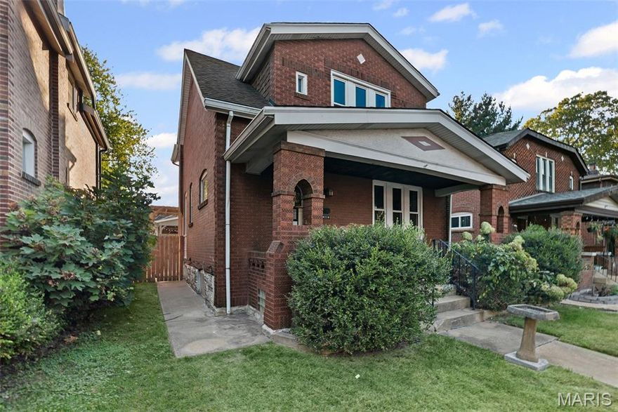 Welcome to this stunning all-brick 3BR/ 1.5BA 2-story home, brimming with timeless character and modern updates. Located just minutes from Carondelet Park and major highways, this beautifully maintained home features beautiful hardwood floors, crown molding, recessed lighting, and fresh paint throughout. The updated kitchen boasts ceramic tile flooring, stainless steel appliances, and convenient access to a private patio and fenced backyard—perfect for entertaining. Enjoy the charm of stained glass windows in the living and spacious dining room. Upstairs, you'll find three generously sized bedrooms and a refreshed hallway bathroom. The dry walk-out basement offers extra storage space, laundry area, and a radon mitigation system for added peace of mind. With 1.5 baths, walk-in closets, new light fixtures, ceiling fans, hot water heater, gutters, and downspouts, this home is move-in ready. An oversized 2-car California-style garage with alley access completes the package. Classic charm meets modern comfort—don’t miss your chance to call this one home!