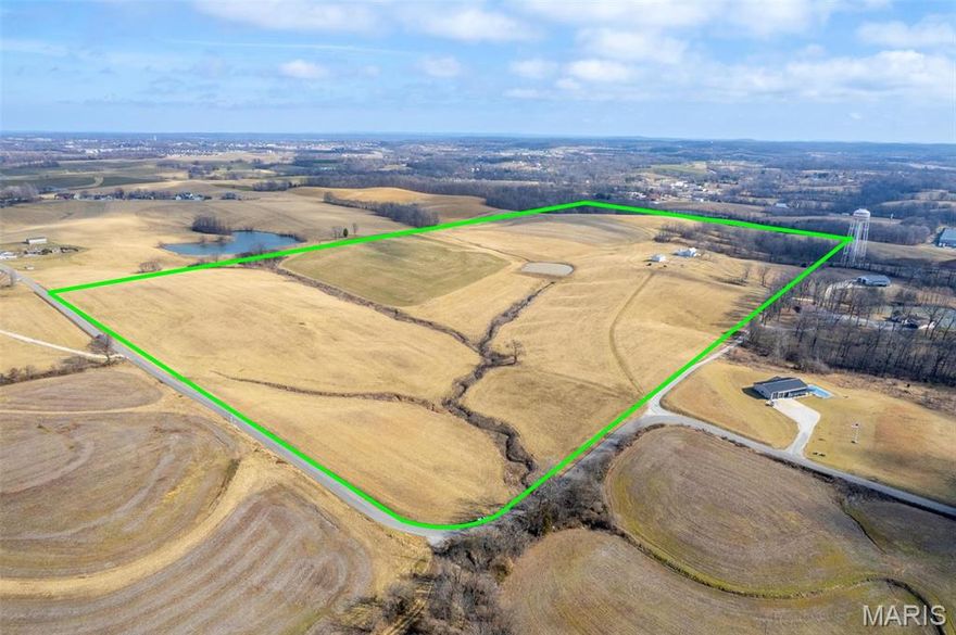 Selling approximately 90+/- Acres of vacant land of 100.42 Acres located just outside of Jackson City limits that sets up perfect for residential development or an exclusive farm or ranch property. Conveniently located off paved county road 435, just 2 miles from uptown Jackson.    
Numerous possibilities consisting of mostly open rolling pasture and some mixed timber. 
Prime residential development with electric accessibility through middle of the property with natural ridgeline that provides a roadway from the southwest corner to the northeast corner-the highest elevation with spectacular views in a rural setting.
An exclusive property to design and construct whatever a Buyer envisions with adequate watershed areas that provide options to build a small lake or ponds. 
Currently used as a hay production property, this farm once supported a tillable crop operation.   
Property to be sold excludes the old farmhouse and structures encompassing approximately 10+/- Acres to be surveyed off and excluded in the sale.