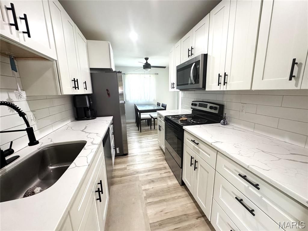 Photo of 11093 Saturn Drive, Maryland Heights, MO 63043 (MLS # 26025441)