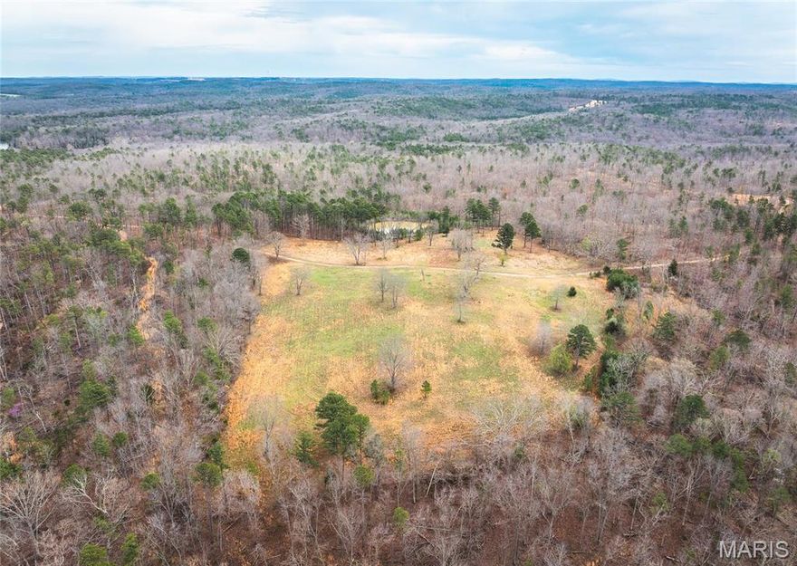 Peanut Butter Ranch is 1,952.11 +/- acres of all-timber ground just outside of Potosi, MO. This secluded tract offers incredible hunting, scenic beauty, and endless recreation. The property includes multiple ponds, a year-round creek, and a cave with a natural spring flowing from its mouth. Some ponds are stocked, perfect for fishing with family and friends. An approved site allows for a 140-acre private lake by impounding Little Fourche a Renault Creek. Miles of trails provide easy access throughout. A 1,100 sq ft cabin and 2,400 sq ft shed with electricity are already in place. The property is loaded with deer and turkey sign, making it a turnkey hunting and outdoor retreat. If you're looking for a large piece of land with multiple water sources and miles of trails with great hunting opportunities, then this is a place for you. Don't miss out on an opportunity of a lifetime!