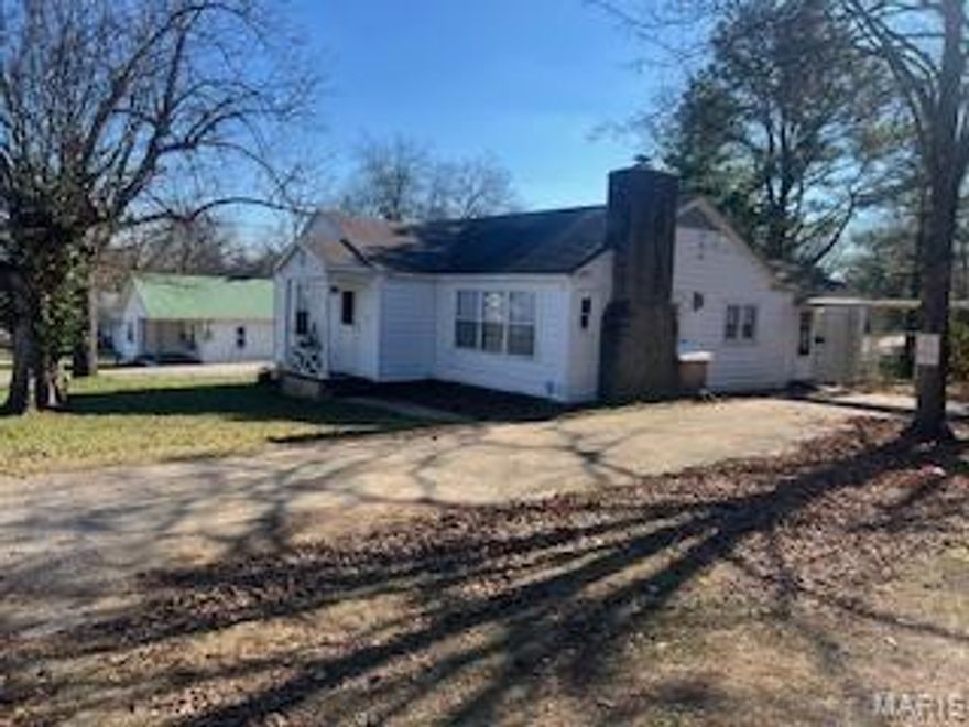 This charming 1940's 2/2 home offers a fireplace, family room, dining room, nice large laundry with kitchen sink cabinets, and built in desk, central H&A, easy walk to school, extra room at 1671 sqft and has room in the 3 car garage for your car and tools. $125,000.