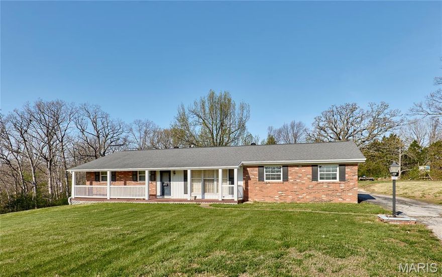 Charming Brick Home On 4 acres m/l In Prime Location just on outskirts of Wentzville city limits with endless possibilities-This home is located just minutes from Wentzville and a mile from The Golf Club of Wentzville! All brick with rear entry oversized 2 car garage plus shed with electric , barn and on 4 acre level lot ! Large living room- kitchen with breakfast room, pantry plus three nice size bedrooms with wood flooring and full bath (recently remodeled) on main level! there are 11 Pella250 vinyl Eclass windows-The walkout lower level has another bath-home has cheap utilities!  being sold as is and is being sold with adjoining property of 1235 Hepperman Rd, there are two tax Id's-there is electricity by eastern barn and a security light