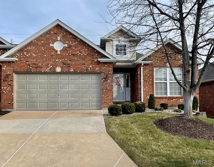 This beautifully maintained, move-in-ready end-unit ranch villa offers 2 bedrooms and 2 full baths with an open, inviting floor plan. The living and dining areas feature vaulted ceilings and bay windows, filling the space with natural light. A spacious hardwood entry foyer welcomes you into the home. The kitchen is well-appointed with custom cabinetry, atrium doors from the breakfast room lead to a private patio, perfect for outdoor relaxation. The primary suite includes a walk-in closet, bay window, and a well-appointed private bath. Additional features include six-panel white doors throughout, main-floor laundry with an extra storage closet, and a convenient attached two-car garage with opener. The full basement offers a large storage area. Solid all-brick construction and a prime end-unit location close to shopping, dining, and everyday amenities make this an easy, low-maintenance home ideal for comfortable living.