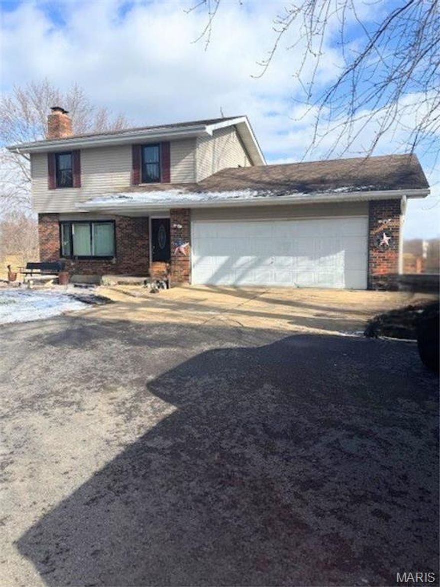 Don't miss the opportunity to own a two-story home on a beautiful 5.6-acre lot in Washington, MO. Nestled in a prime location with easy access to town amenities, this property offers space, privacy, and potential. With multiple updates including all new windows, newer roof, back-up generator, solar panel/energy efficiency, newer HVAC, and new flooring, along with dual fireplaces and a partially finished basement, this home has so much to offer. The generous lot is perfect for family fun, adding a garden, or adding a shop! Located in a sought-after school district, this property is perfect for those wanting room to grow while staying close to everything Washington has to offer.