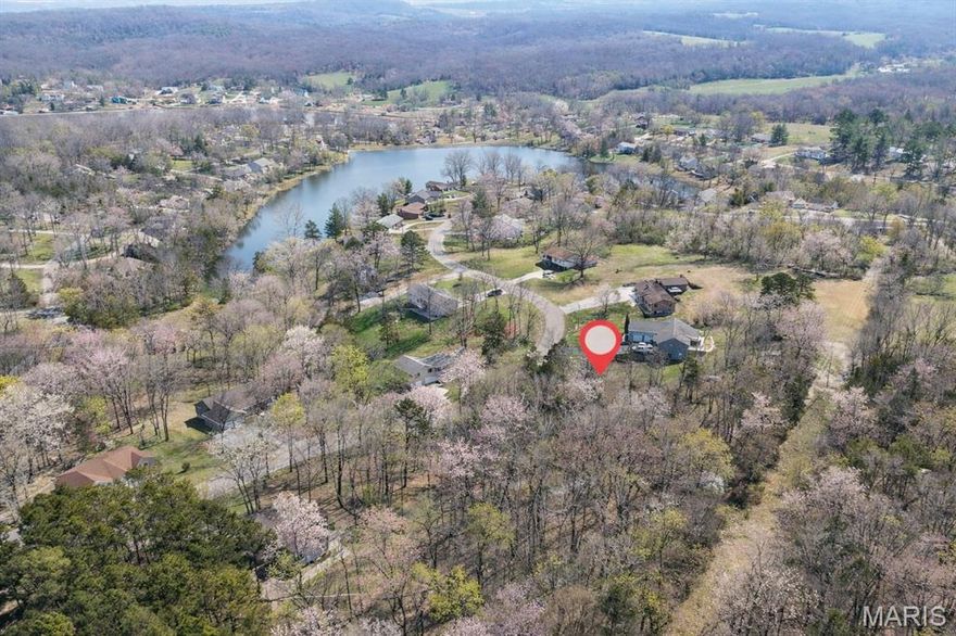 Build your dream lake home in the beautiful Lake Forest Estates Subdivision in Sainte Genevieve! This is a buildable lot offers the perfect opportunity to bring your own builder and create a home tailored to your lifestyle. Enjoy lake living at its finest with access to three lakes, sandy beach, great fishing, boating, clubhouse, pool and picnic area with pickelball and tennis courts. The community provides a relaxing setting with plenty of recreational amenities for residents to enjoy year around. Conveniently located just minutes from Highway 55, this property  backs up to tree lines for some privacy and peaceful surroundings. Come experience the lake lifestyle and make this fantastic lot yours today!!