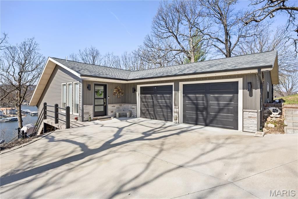 Photo of 475 Woodland Point, Linn Creek, MO 65052 (MLS # 26018531)