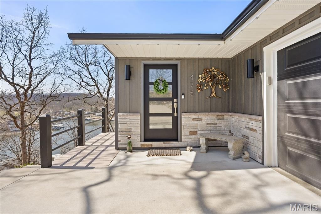 Photo of 475 Woodland Point, Linn Creek, MO 65052 (MLS # 26018531)