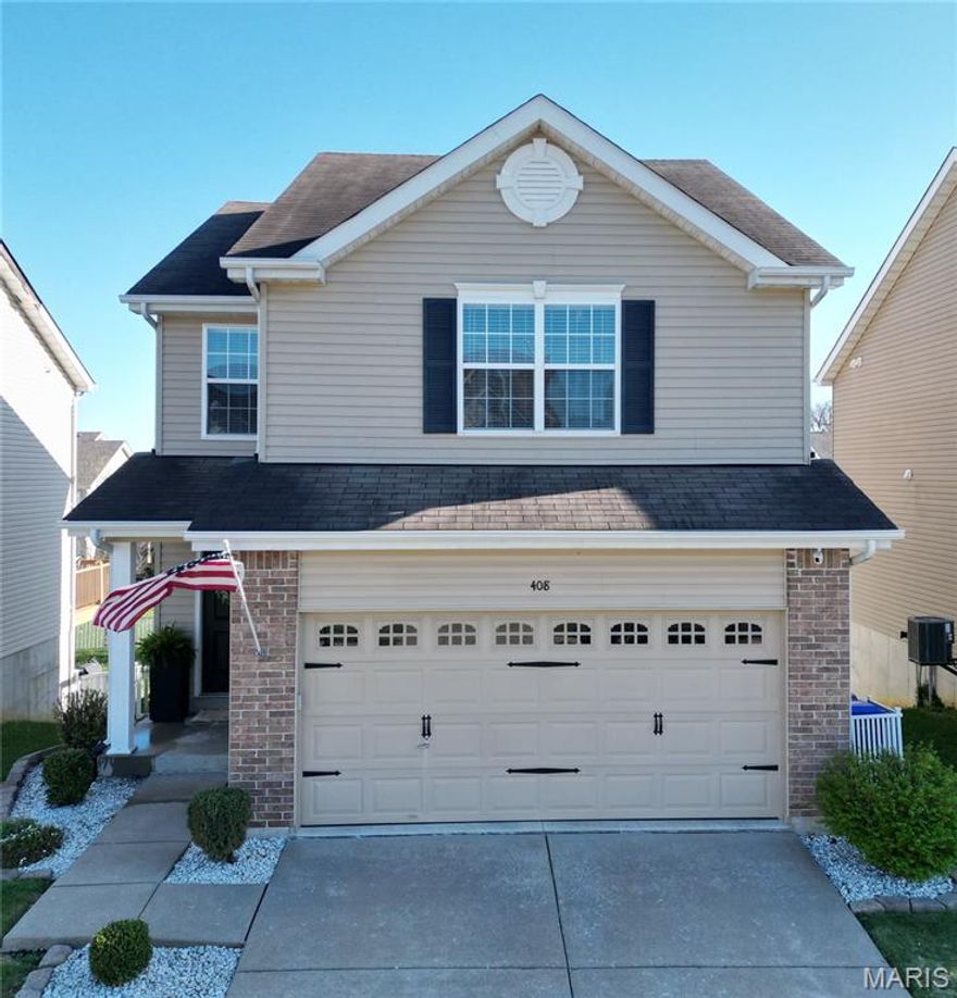 WELCOME TO 408 SPRING TRACE in desirable O’Fallon! This beautifully maintained two-story home offers the perfect blend of comfort, style, and functionality. With 1,689 square feet above grade plus a finished basement, there’s plenty of space to live, work, and entertain.

Step inside to find durable and stylish LVP flooring throughout the main level, complemented by updated light fixtures that create a fresh, modern feel. The kitchen features 42” cabinets, ample storage, and includes a refrigerator that stays with the home—making your move even easier.  Just off the kitchen and dining area, enjoy outdoor living on the deck, perfect for relaxing or hosting gatherings.

Upstairs, the spacious primary suite showcases elegant coffered ceilings, adding a touch of sophistication. With a total of 4 bathrooms - 2 full and 2 half convenience is built into every level of the home.

The finished walkout basement is an entertainer’s dream, boasting a large recreation room and a bathroom—ideal for guests, game nights, or a private retreat.

Additional highlights include an extended 2-car garage with upgraded doors, underground gutter drains, a Ring doorbell, and low-maintenance vinyl siding with brick veneer. Built in 2011, this home has been meticulously cared for and is truly move-in ready.

Enjoy fantastic subdivision amenities including a community pool, basketball court, and dog park—something for everyone!

Don’t miss your chance to own this exceptional home in a great location!  Oh, and very important - Costco is being built less than 2 miles away!!

SCHEDULE YOUR SHOWING TODAY!!!  Showings start 4/9/2026 after noon.