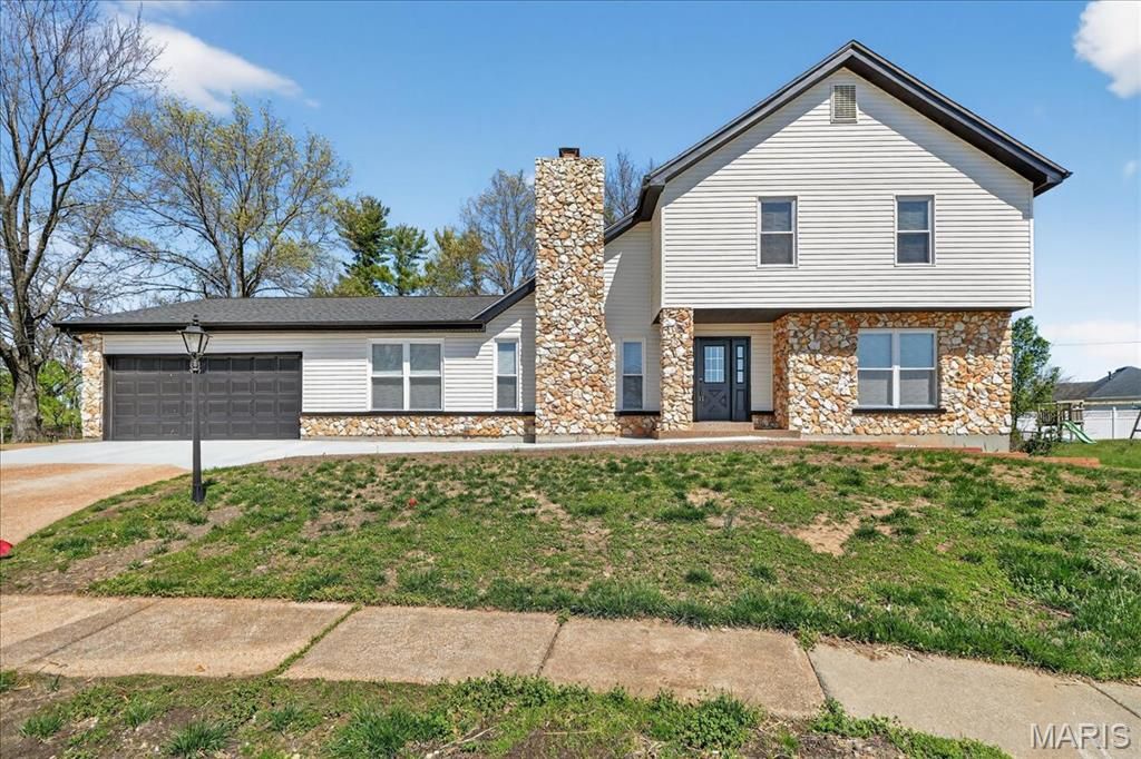 Photo of 5039 Amber Place Drive, St Louis, MO 63128 (MLS # 26019870)