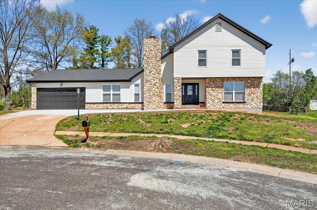 Photo of 5039 Amber Place Drive, St Louis, MO 63128 (MLS # 26019870)