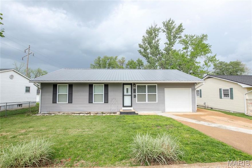 Charming and functional, this well maintained 3-bedroom,1 bath home offers comfortable living with great features throughout. Enjoy a spacious, modern kitchen with plenty of room for cooking, dining, and gathering. The home also includes a convenient 1-car attached garage, main floor washer and dryer hookup, and central A/C with forced air heat for year round comfort.
Step outside to a large deck overlooking a fenced backyard-perfect for entertaining, pets or relaxing in your private space. A durable metal roof adds long-term value and peace of mind, while a separate workshop/storage building provides extra space for hobbies, tool, or additional storage.
Well maintained with nice curb appeal, this property is ideally located close to shopping, dinning, parks, and everyday amenities. With a practical layout and desirable features, this home is ready to meet your everyday needs.