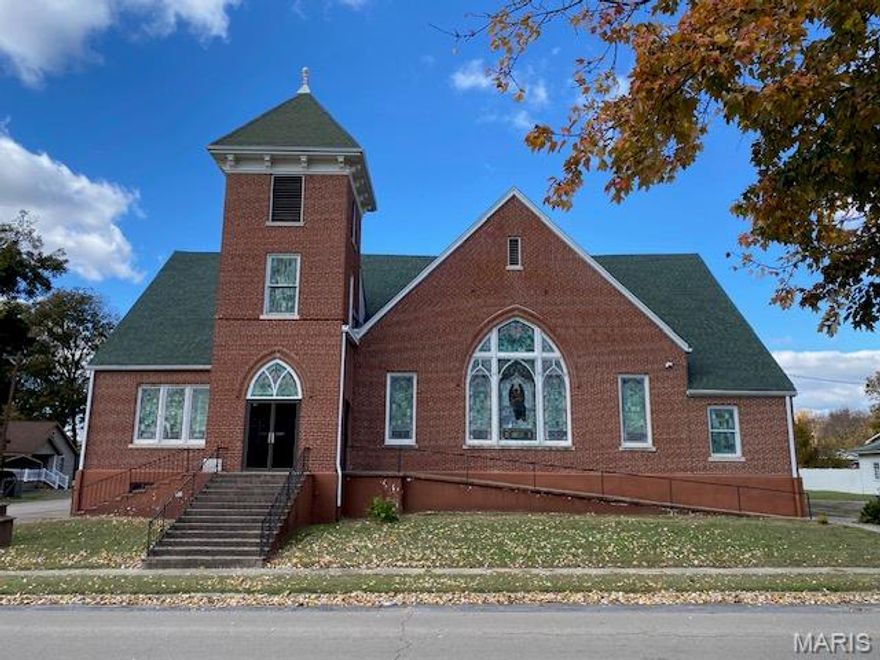 Beautiful church and rectory in the heart of Oran, Missouri!
Offered together, these well-maintained properties present a rare opportunity full of potential. The owner is open to selling the properties separately for the right price.

This well-preserved historic church, complete with a traditional church bell, features stunning woodwork, breathtaking stained glass, and updated electrical systems with renovations completed in 2007. The church offers approximately 7,000 sq. ft. of space, including a full lower level with bathrooms and a complete kitchen — ideal for gatherings or events.

The rectory is a charming brick home of approximately 1,530 sq. ft., featuring three bedrooms, two full baths, a kitchen, living room, dining room, and laundry room. It also includes updated electrical and HVAC systems for modern comfort and efficiency.

Set on a spacious lot with mature trees, this property combines small-town tranquility with timeless character — perfect for a new or relocating church, multi-use facility, event space, or community center.

Prime location. Classic charm. Endless possibilities in Oran, Missouri!