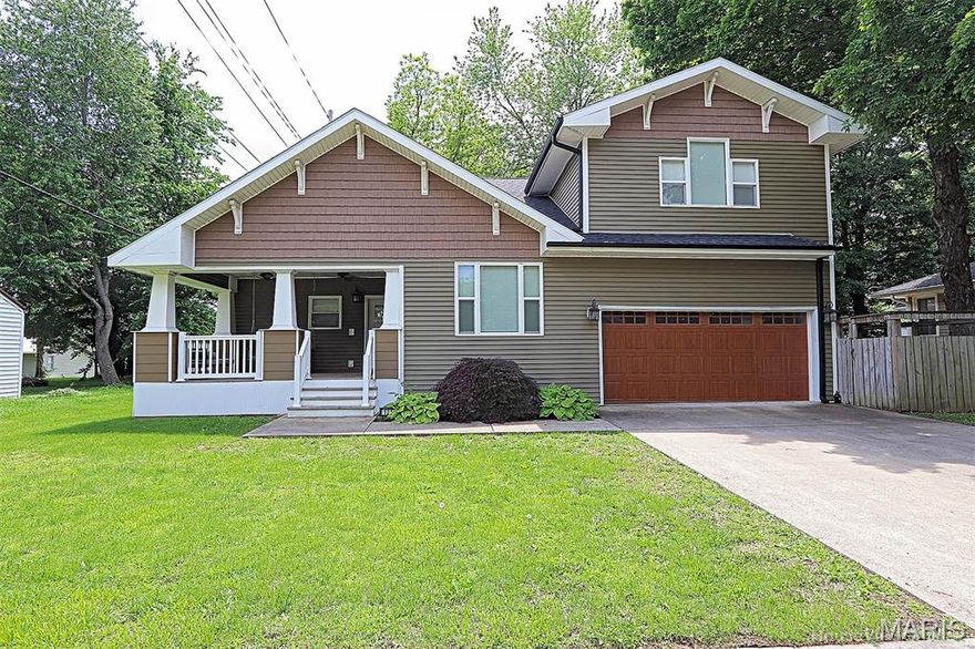 Charming Craftsman Home with Modern Updates & Outdoor Oasis…Prime location with small-town charm! Welcome to this stunning 1.5-story Craftsman-style home in the heart of Benton, MO! Boasting over 2,591 square feet of beautifully remodeled living space, this 4-bedroom, 3-bath gem offers the perfect blend of character and modern comfort. Inside you will find an open floor plan with vaulted ceilings and rich woodwork throughout, creating a warm and inviting atmosphere. The spacious main-floor master suite features a luxurious tiled shower and relaxing jacuzzi tub – your private retreat after a long day. You’ll love entertaining in the expansive backyard, complete with a custom gazebo and bar area – perfect for summer gatherings or quiet evenings under the stars. Additional features include: a completely remodeled interior and exterior, a large kitchen and living area, ideal for hosting an attached 2 car garage and a spacious driveway.