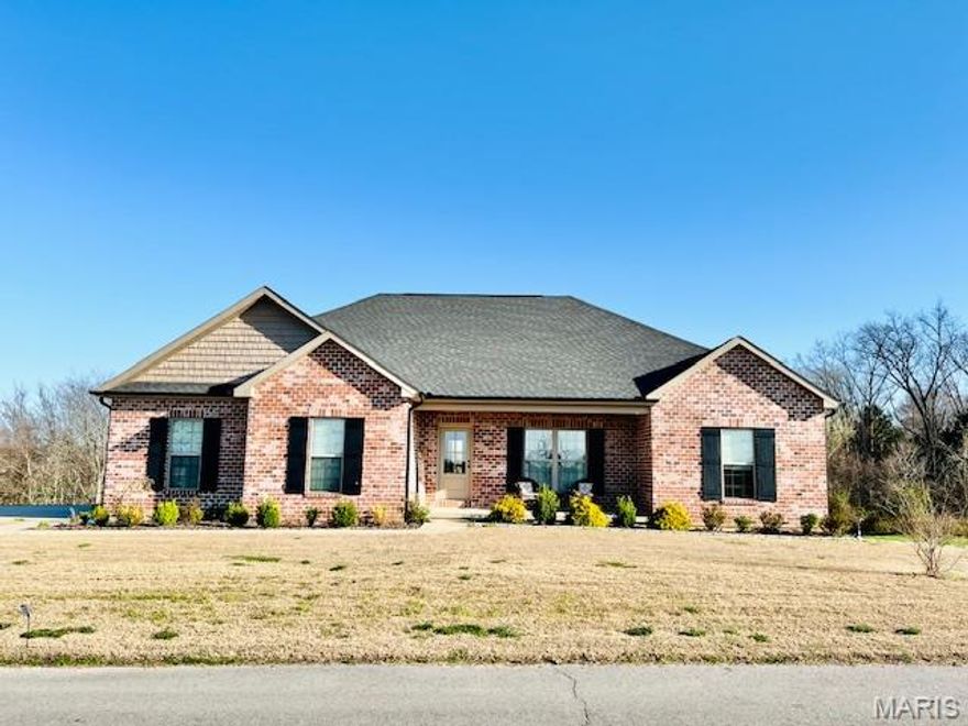 Are you searching for your dream home in the Jackson School District, located just outside the city limits on 1.13 acres? Look no further—this is it! Relax on the covered front porch and take in the scenic views for miles, or enjoy the covered back deck or patio while watching the wildlife in the woods behind you.

This charming brick home features three bedrooms on the main level, including a primary suite, and one bedroom downstairs. There are two bathrooms on the main level and one downstairs, along with a walkout basement filled with numerous amenities. You must see this home to fully appreciate all it has to offer.

Main Level Highlights:
- 10-foot ceilings in the living room, dining room, and kitchen
- Spacious kitchen with a large island that includes a sink, soft-close Beussink cabinets, a walk-in pantry, and Quartz countertops
- Stainless steel Kitchenaid appliances
- 42-inch base cabinets with Quartz countertops and engineered wood flooring throughout
- Split-floor plan layout

Primary Bedroom Features:
- Tray ceiling with crown molding
- Soaking tub, separate shower, double vanity, and large walk-in closet

Walk-out Basement Highlights:
- Large guest bedroom
- Full bathroom
- Large family room with refreshment station featuring microwave, beverage fridge, and plenty of cabinet storage.
- Game room 
- Large storage room
- John Deere room

Don’t hesitate—this home is ready for new owners! Agent-Owner