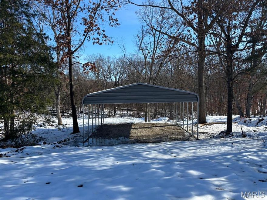 Don’t miss out on this exceptional opportunity to own one of the most sought-after properties near Mark Twain Lake! Located just minutes from Jellystone Park and Roosters Bar & Grill, this 3.9-acre tract offers the perfect combination of seclusion, recreation, and convenience.

This mostly wooded property features mature hardwoods and is ideal for a private retreat, investment opportunity, or small RV getaway.

Property Highlights- 4 RV Pads – Each with full hookups including water, electricity, fiber optic, and sewer -- Large Pavilion – Perfect for gatherings with family and friends -- 3.9 Acres – Secluded, wooded, and serene -- Abundant Wildlife – Deer, turkey, squirrels, and rabbits -- Adjacent to Corps Ground – Non-hunting area for added peace and privacy.

Enjoy boating, fishing, and hiking at Mark Twain Lake, or take advantage of nearby hunting, camping, and shooting activities. Whether you’re looking for a private getaway, investment property, or mini campground, this unique tract offers endless potential.

See it. Love it. Own it. Don’t wait — this rare find won’t last long!