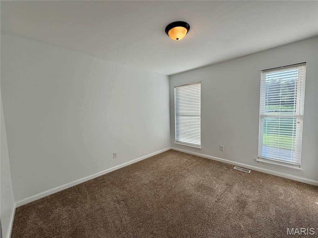 Photo of 14502 Cazado Drive #E, Chesterfield, MO 63017 (MLS # 26053370)