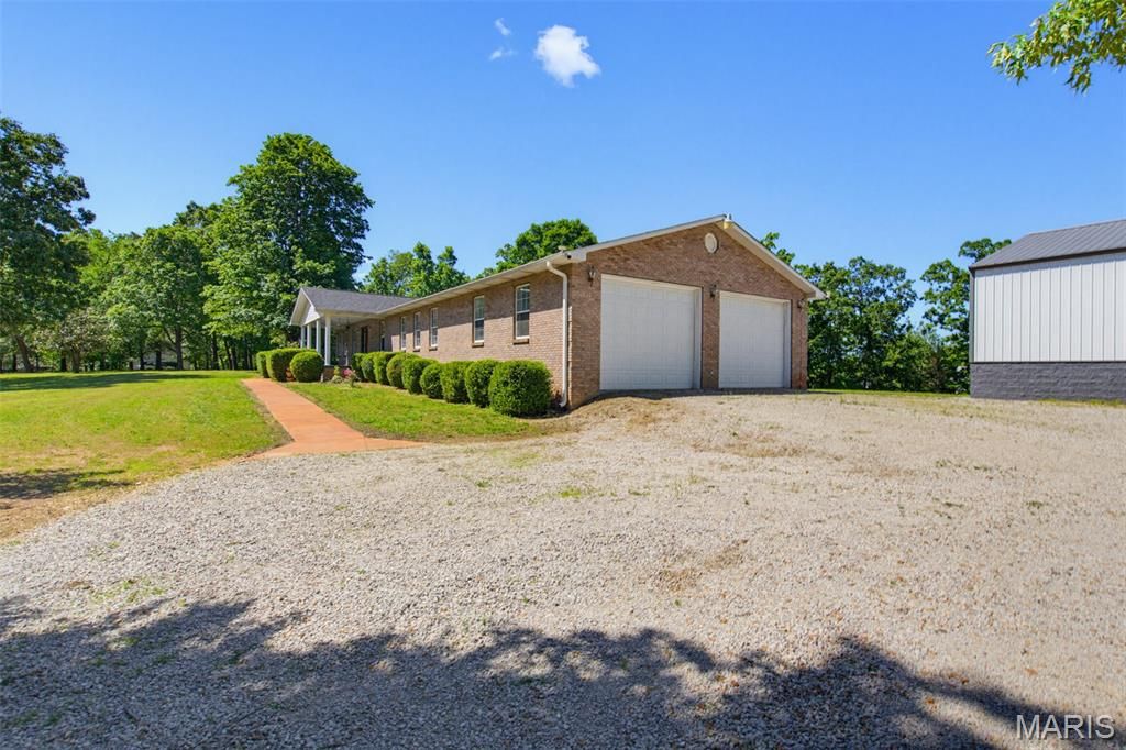 Photo of 105 Ripley 142E-20F, Doniphan, MO 63935 (MLS # 26029034)