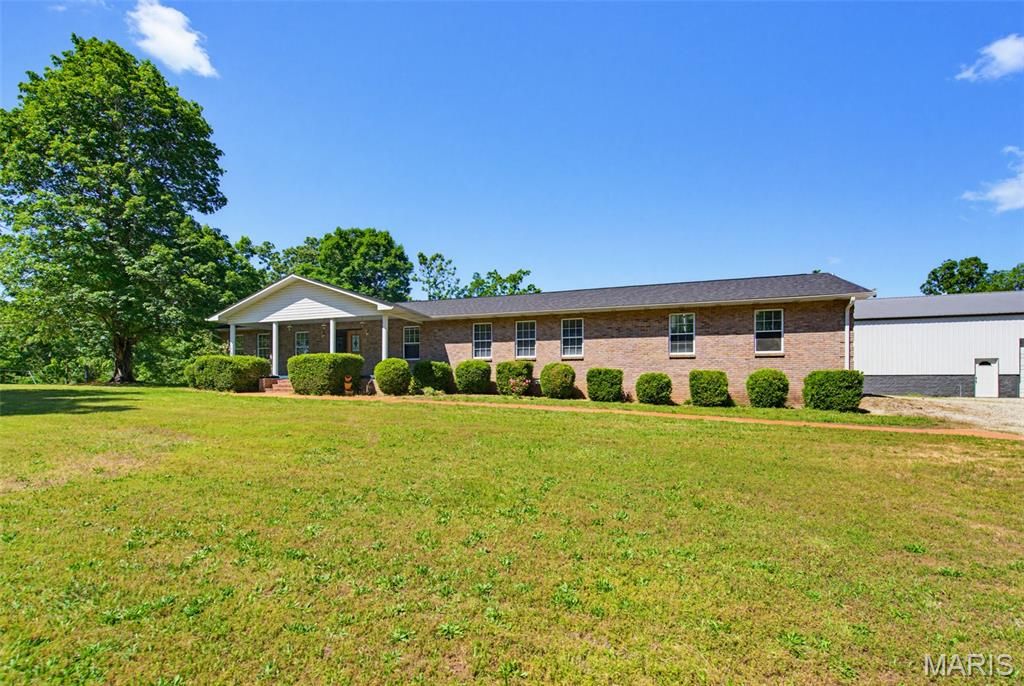 Photo of 105 Ripley 142E-20F, Doniphan, MO 63935 (MLS # 26029034)